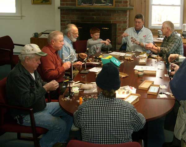 fly tyers enjoy the conference room at the WPWA campus