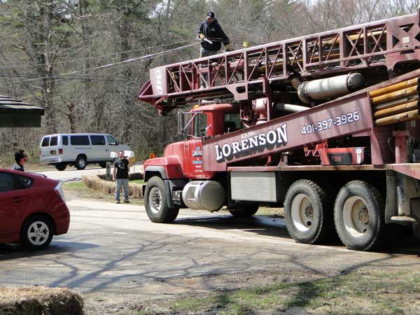 carefully making way for the well digger!